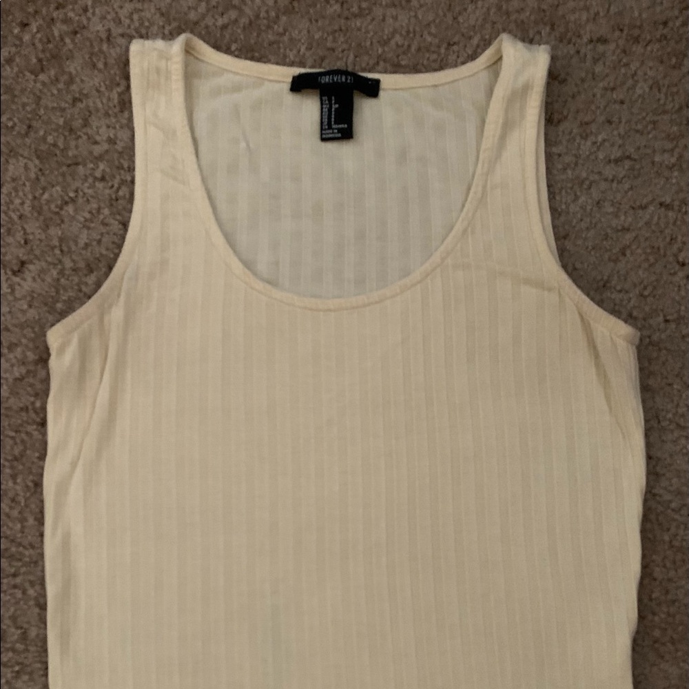 Pastel yellow shorter tank top ribbed two finger shoulder straps
